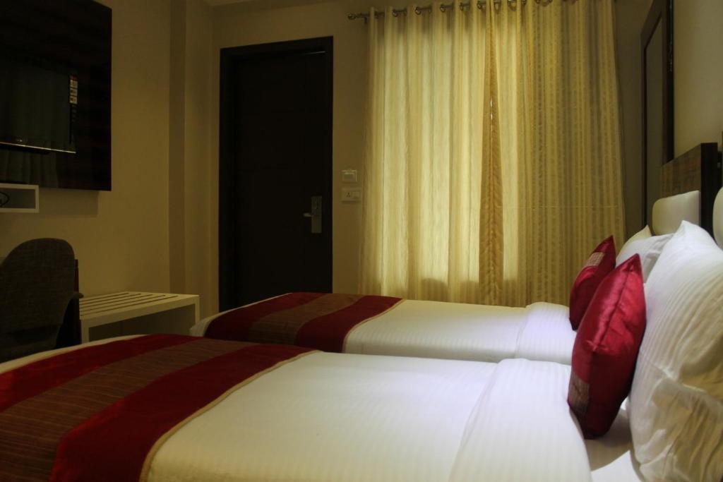 Hotel Gulnar Yeni Delhi Oda fotoğraf